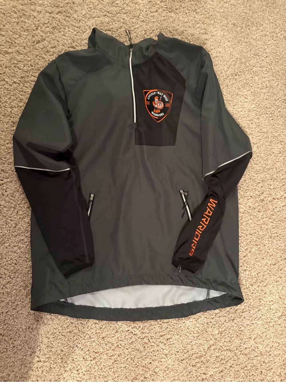 Gray and Black Pullover Jacket with Orange Logo